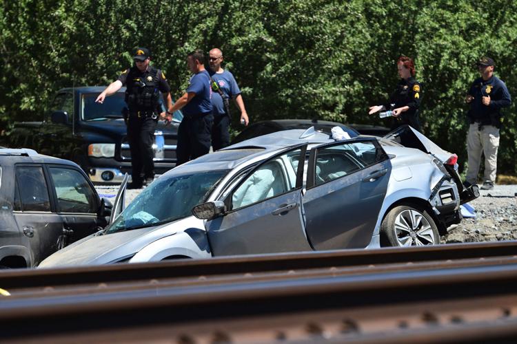 Train collides with vehicle at California intersection without crossing arms, killing three