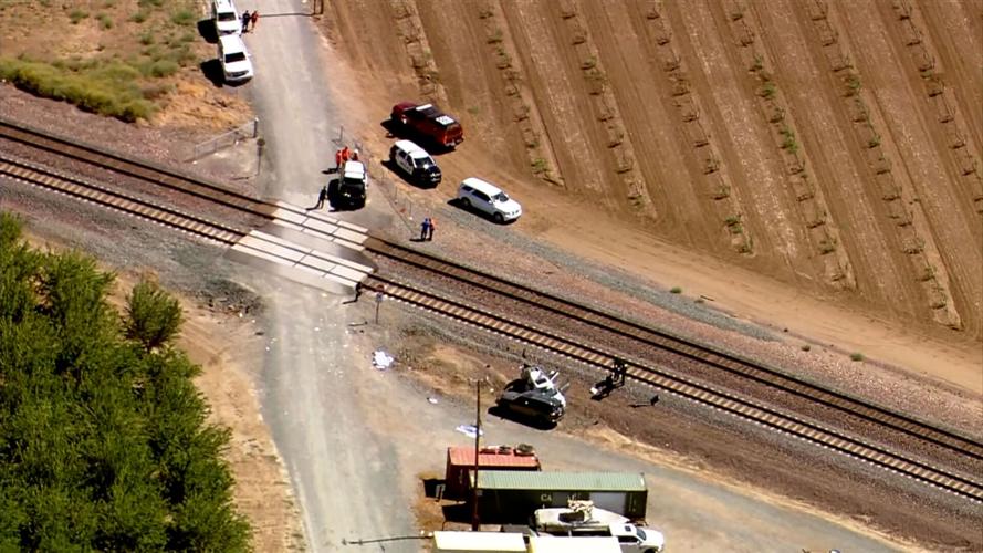 Train collides with vehicle at California intersection without crossing arms, killing three